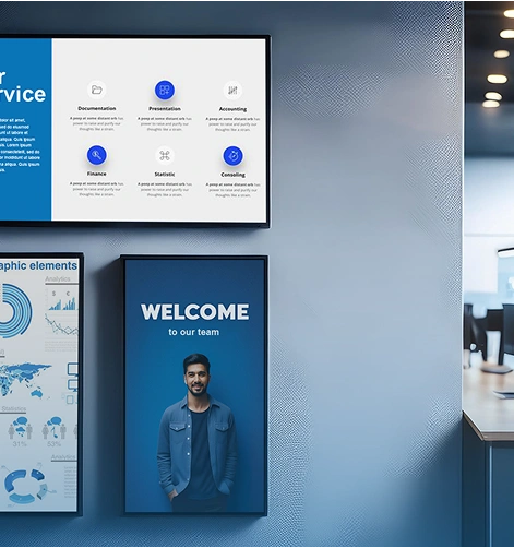 Digital signage obrazovky spravované softwarem Displio zobrazující firemní informace, statistiky a přivítání nového zaměstnance.